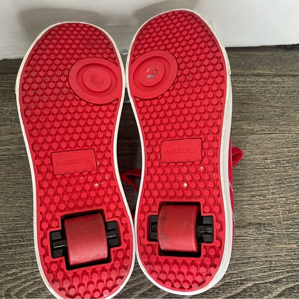 Heelys Red Sneakers with White Logo. Size 7.Skate shoes. Used- has marks.